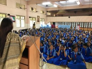 Bhavana educating girls on menstrual hygiene